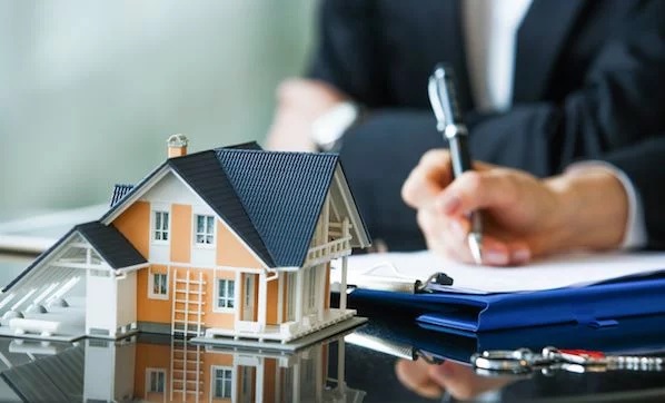 Karnataka govt to simplify real estate rules for poor