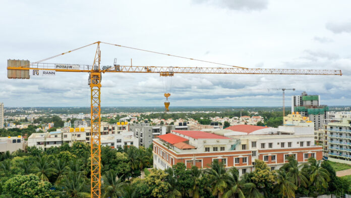 Rann Infra Equipment Tower Crane rented by SV Prime for residential development in Whitefield, Bengaluru