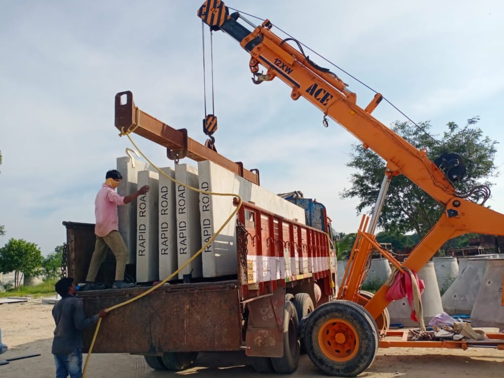 The activities of preparing the bed for the panel and moving the panel to the road was seen