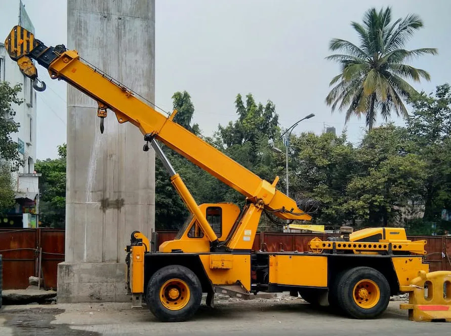 Material Lifting and Transporting with Pick and Carry Cranes
