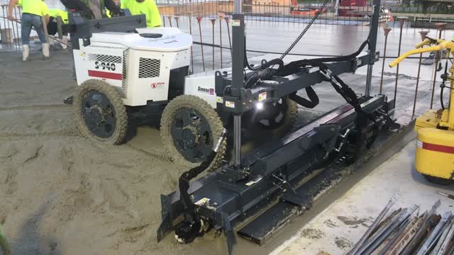 Levelling of Concrete floors using Laser Screed Machine