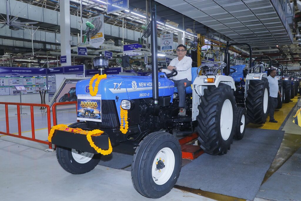 Director Manufacturing and Plant Manager Ravi Kundra flagging off the 800000th tractor
